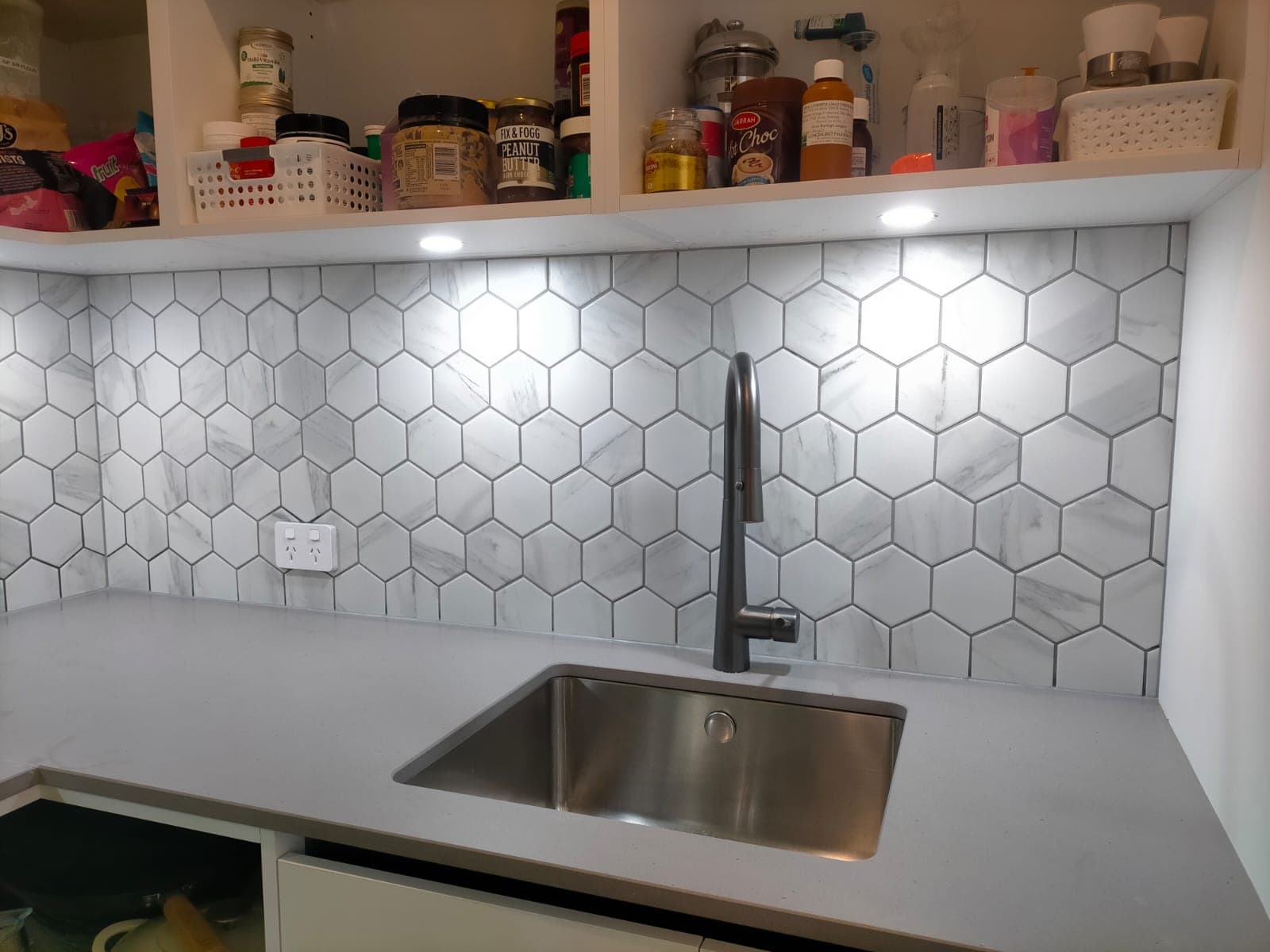 Pantry splashback — hexagon tile installation