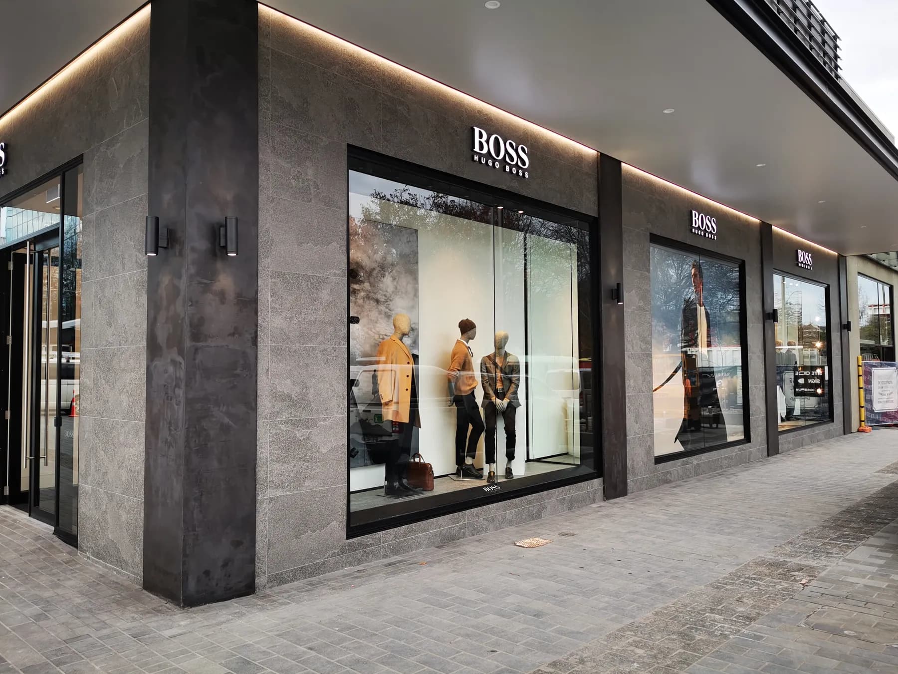 Hugo Boss Christchurch storefront with large-format stone cladding by JSR Tiling