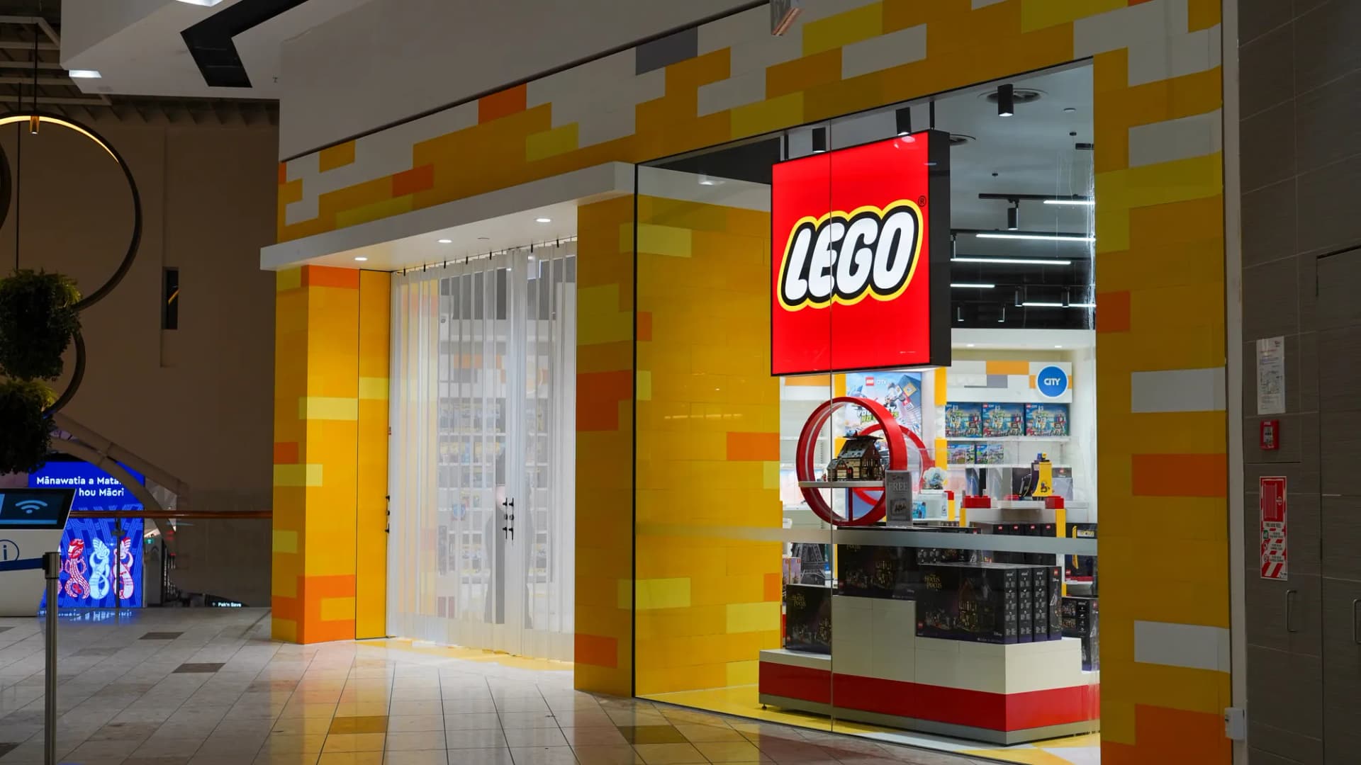 Large-format retail floor tiling at the LEGO Store Christchurch by JSR Tiling